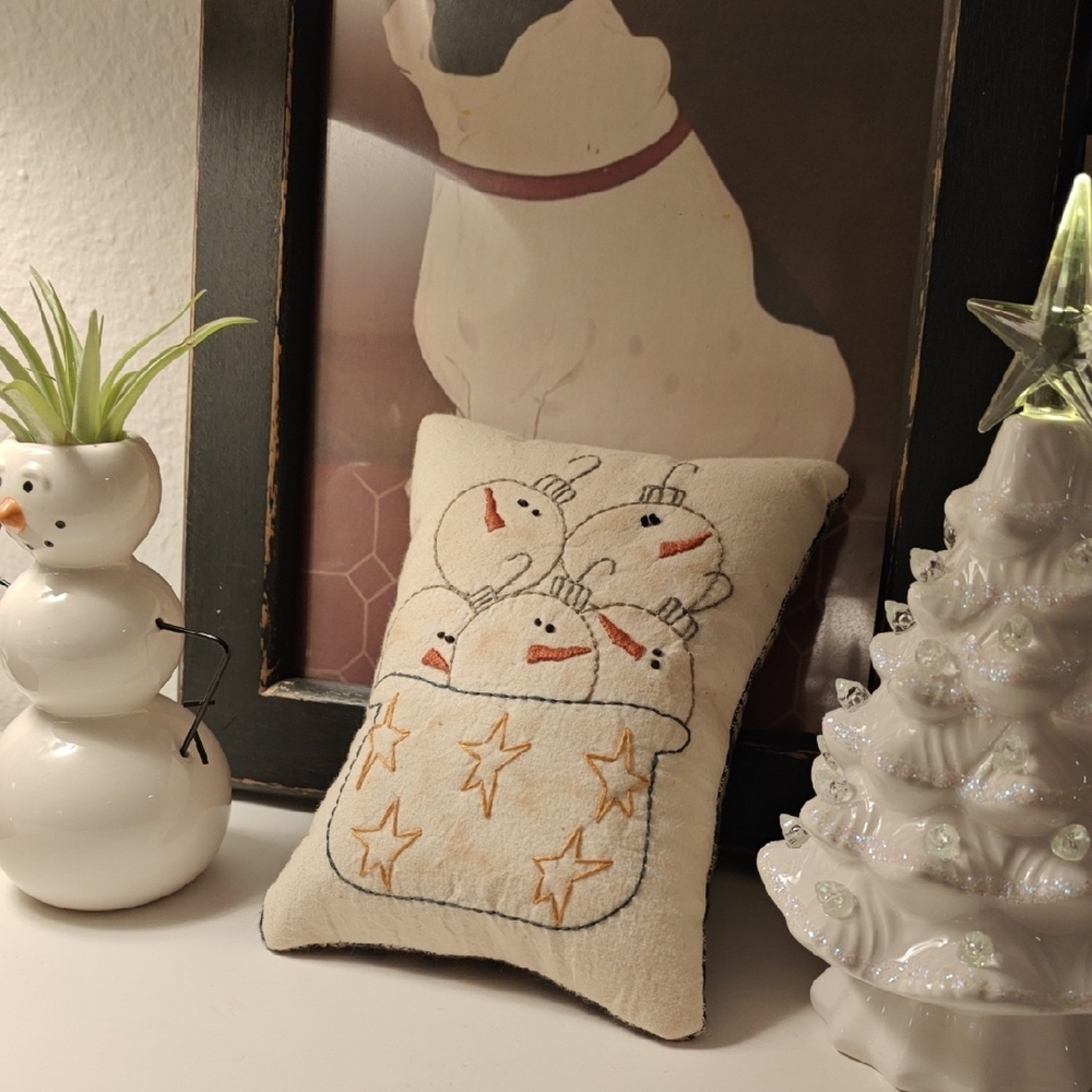 Holiday Cream Pillow with Snowman Basket Design